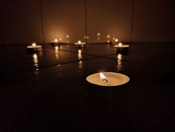 High angle view of illuminated lamp on table