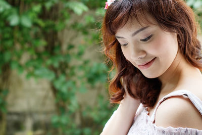 Close-up of smiling young woman