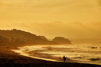 Scenic view of sea against sky during sunrise