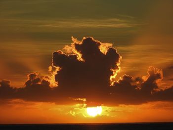 Low angle view of dramatic sky during sunset