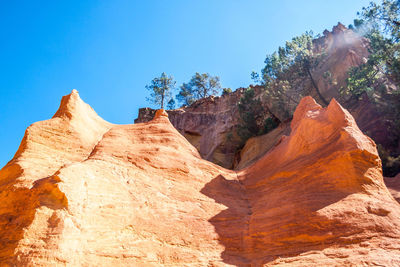 Rock formation with sky in background