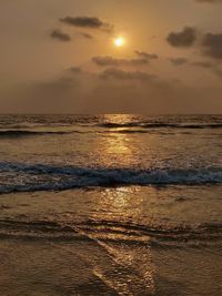 Scenic view of sea against sky during sunset