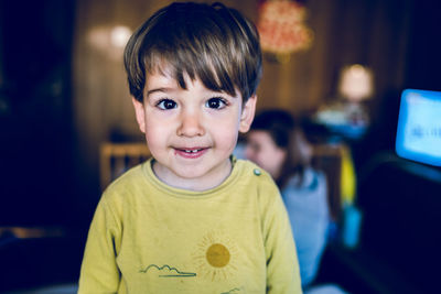 Portrait of cute smiling boy at home