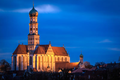 View of buildings against blue sky