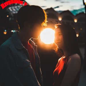 Close-up portrait of young couple