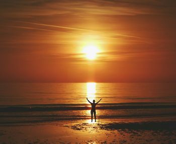 Scenic view of sea at sunset