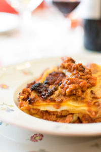 Close-up of meal lasagna served in plate