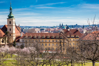 Prague city seen from the petrin gardens at the begining of spring