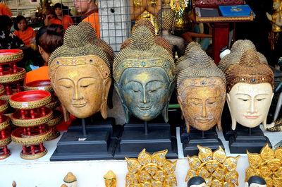 Buddha busts at market stall