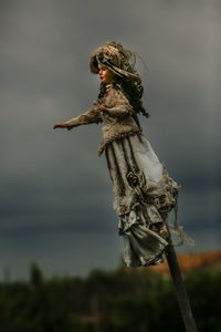 Low angle view of statue against sky