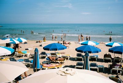 Panoramic view of people on beach