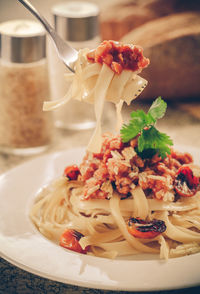 Close-up of pasta in plate on table