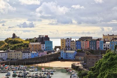 High angle view of townscape by buildings against sky