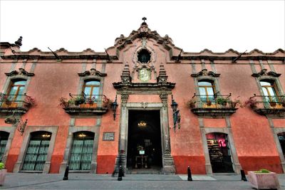 Low angle view of historic building against sky