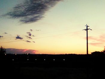 Silhouette landscape against sky during sunset