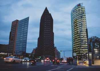 Skyscrapers in city against sky