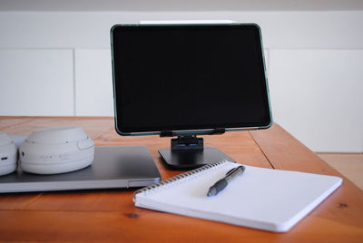 Close-up of laptop on table setup homeoffice