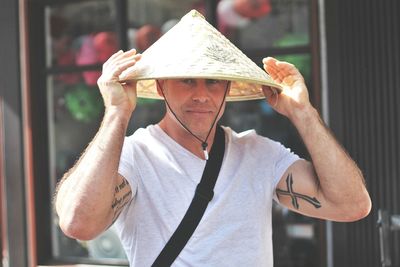 Close-up of hand holding cup