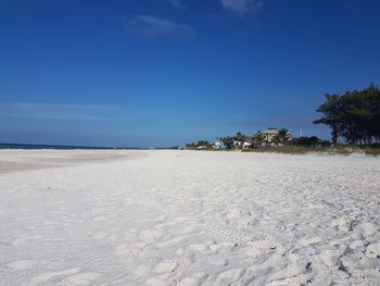 Scenic view of beach against clear sky