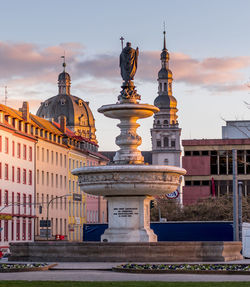 Statue of historic building against sky