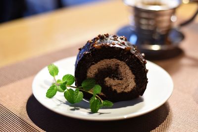 Close-up of cake served on table