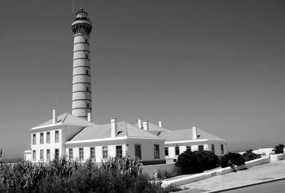 Low angle view of lighthouse against clear sky