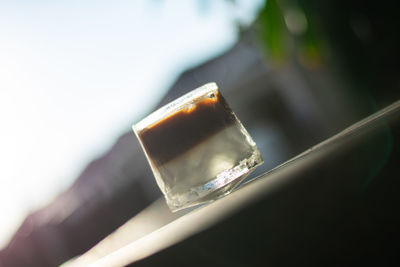 Close-up of drink on cigarette