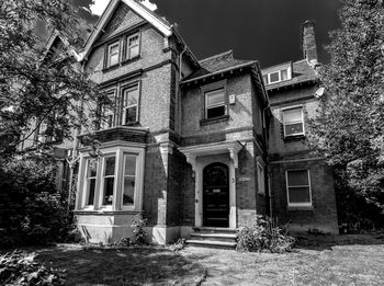 Low angle view of old building at night