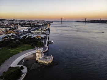 High angle view of bridge over river at sunset