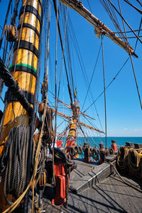 Deck with masts and ropes of wooden age of sail sailing ship