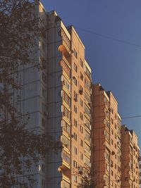 Low angle view of modern building against sky
