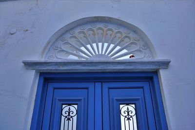 Low angle view of closed door of building