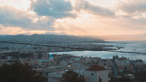 High angle view of cityscape against sky during sunset