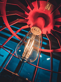 Low angle view of illuminated light bulb