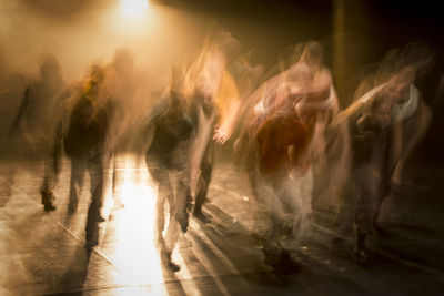 Blurred motion of people at nightclub