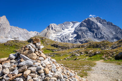 Scenic view of rocky mountains against clear blue sky