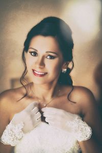 Close-up portrait of smiling young woman