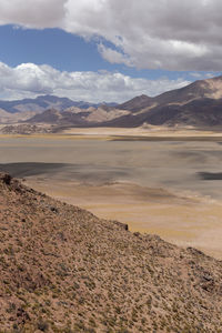 Puna, cordillera de los andes. scenic view of beach against sky