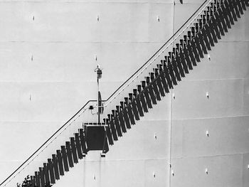 Low angle view of staircase against wall