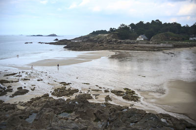 Scenic view of beach against sky