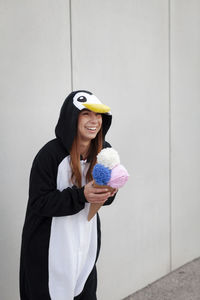 Woman in costume standing outdoors