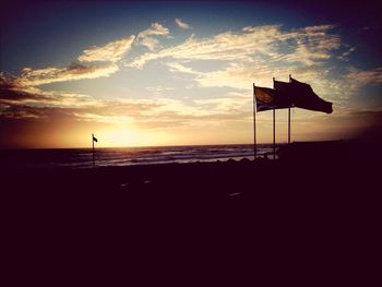 Scenic view of sea at sunset