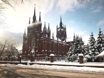 Panoramic view of buildings against sky during winter