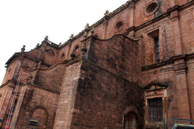 Low angle view of historical building against sky