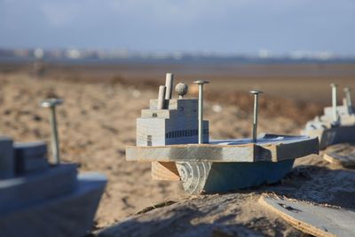 Toy wooden boats on the beach