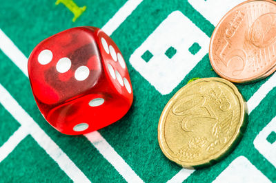 High angle view of coins on table