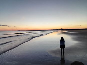 Scenic view of sea at sunset