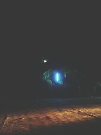 Illuminated street light at night