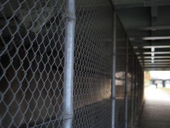 Close-up of chainlink fence in building