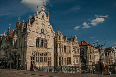 St. michael bridge and gothic buildings in ghent. a city full of gothic buildings in belgium.